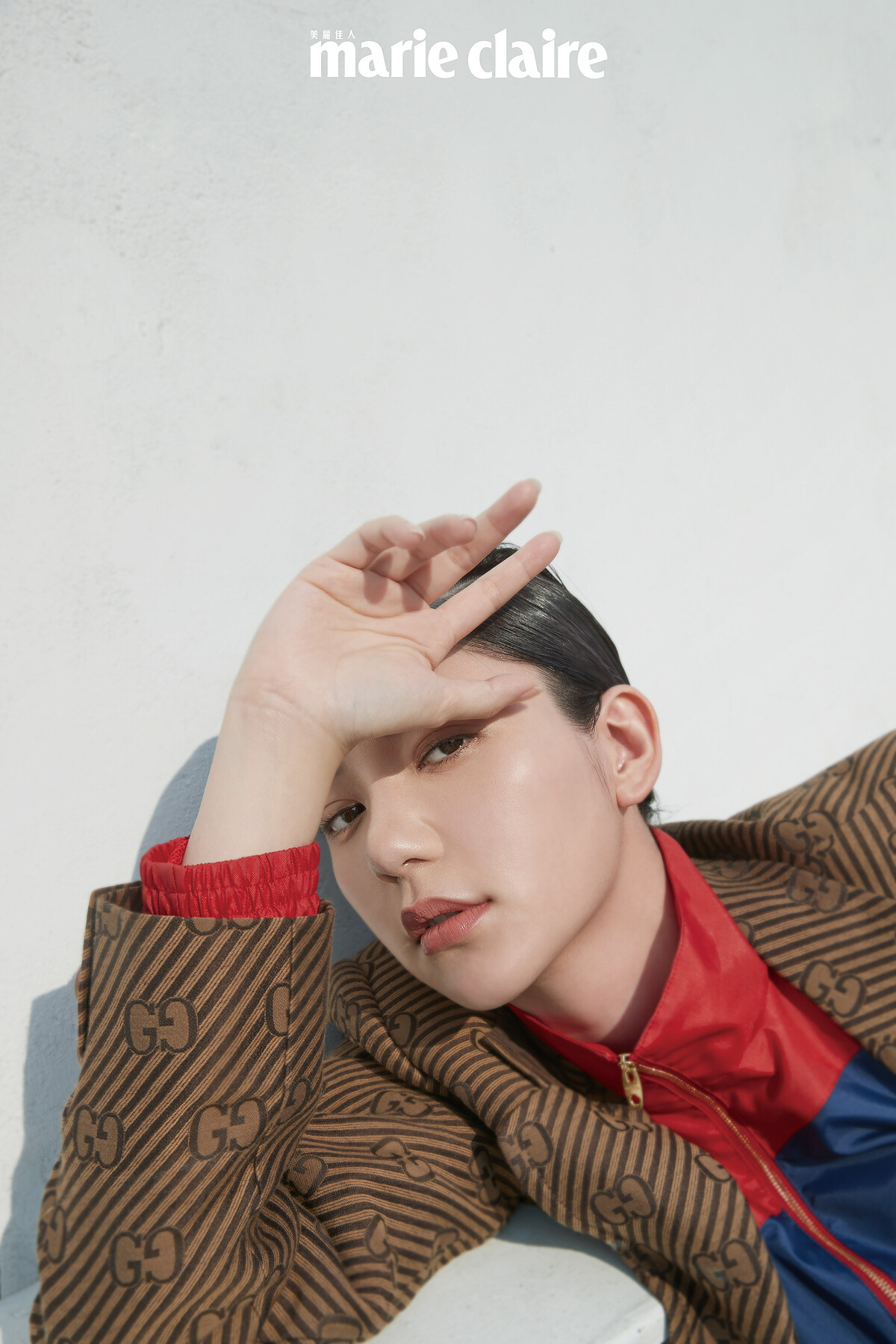 雙色運動外套、西裝外套，both by Gucci。