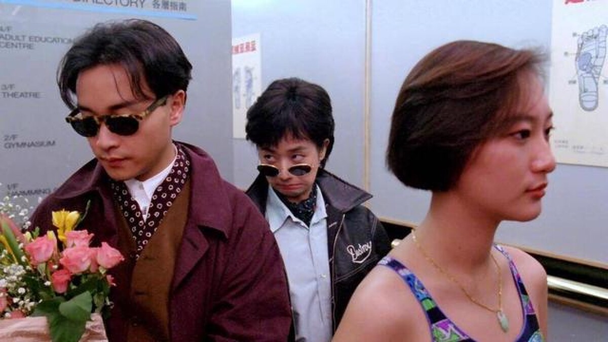 《家有囍事》中的張國榮,服裝走經典卻不無聊的紳士風格。