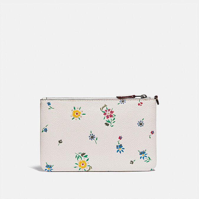 Coach 狂野花卉印花小型手腕包，NT4,500