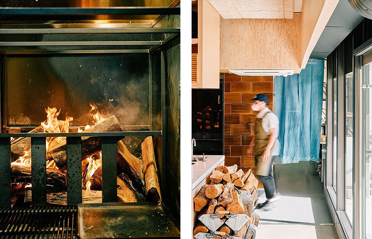 餐廳空間設置了顯眼的明火壁爐。