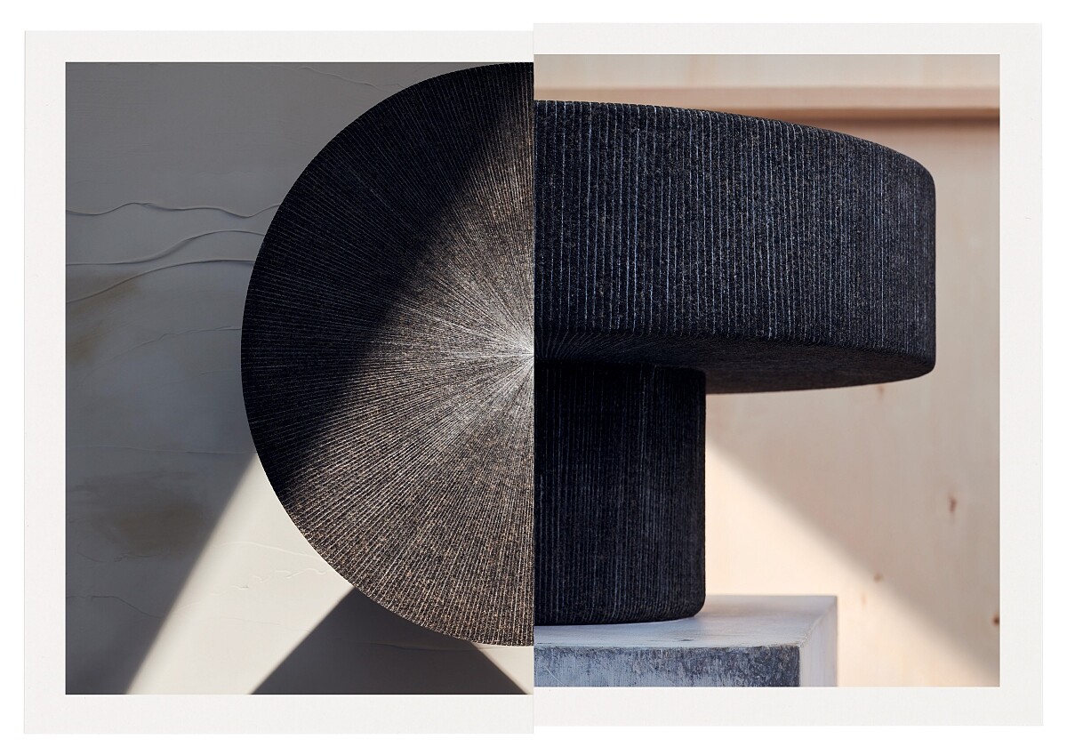 有著灰色石料材質的 Lignage d&rsquo;Herm&egrave;s 系列石桌。