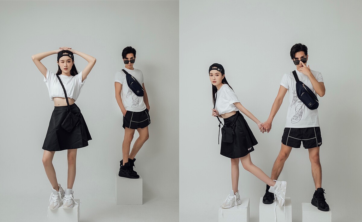(MANDY)白色短袖上衣NT1,500，個性側背包NT2,100，黑色圓弧短裙NT3,580，BIG LOGO TRAINER PUFFED高筒鞋NT5,180（以上皆為建議售價）。 (MANDY男友) 白色球鞋塗鴉上衣NT1,500，中性短褲NT4,380，腰包NT5,400，BIG LOGO TRAINER PUFFED高筒鞋NT5,180（以上皆為建議售價）。