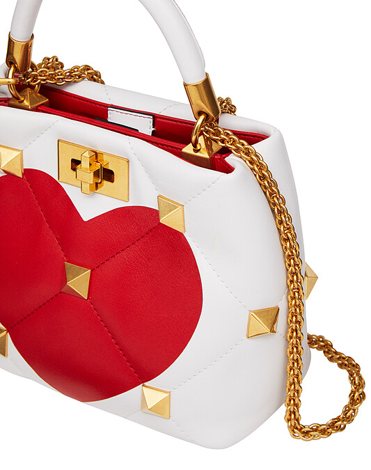 愛心圖紋大鉚釘裝飾提包，NT98,000