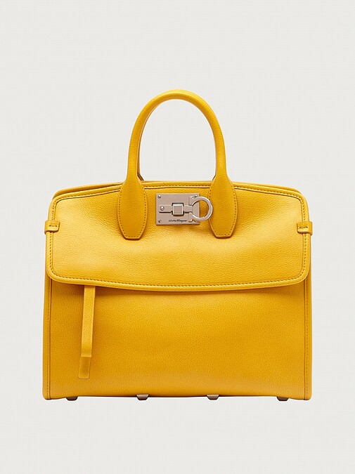 亮黃色手提袋,價格店洽。