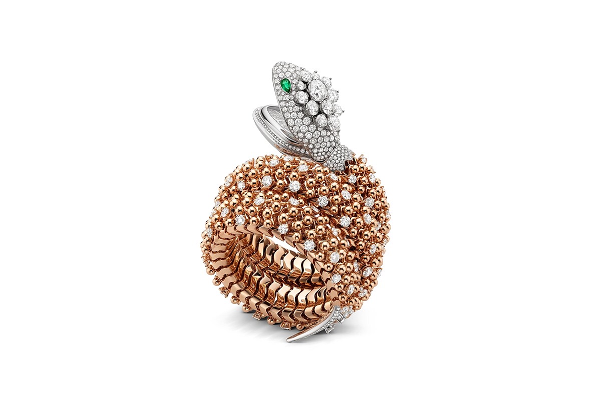 BVLGARI SERPENTI MISTERIOSI PALLINI頂級玫瑰金鑲鑽腕錶 寶格麗專屬石英機芯；小時與分鐘顯示；防水深度30公尺。 錶徑40MM，白K金頭部鑲有明亮切割鑽石和祖母綠蛇眼，白K金錶殼錶盤，錶殼尾部鑲有明亮切割鑽石，玫瑰金手鍊鑲有明亮切割鑽石，鑲嵌540顆鑽石(總重約24.9克拉)，2顆祖母綠(重約0.55克拉)。 參考售價: 約新台幣8,884,000元