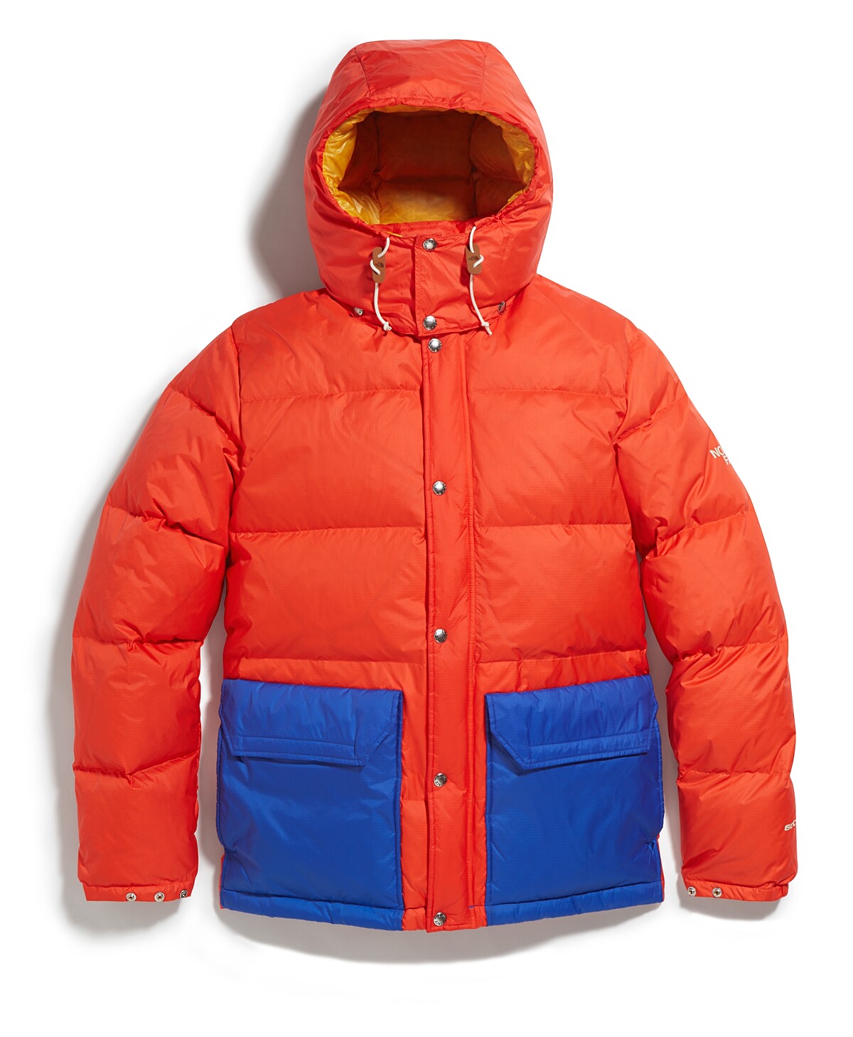 The North Face 橘色拼接羽絨外套，價格店洽。