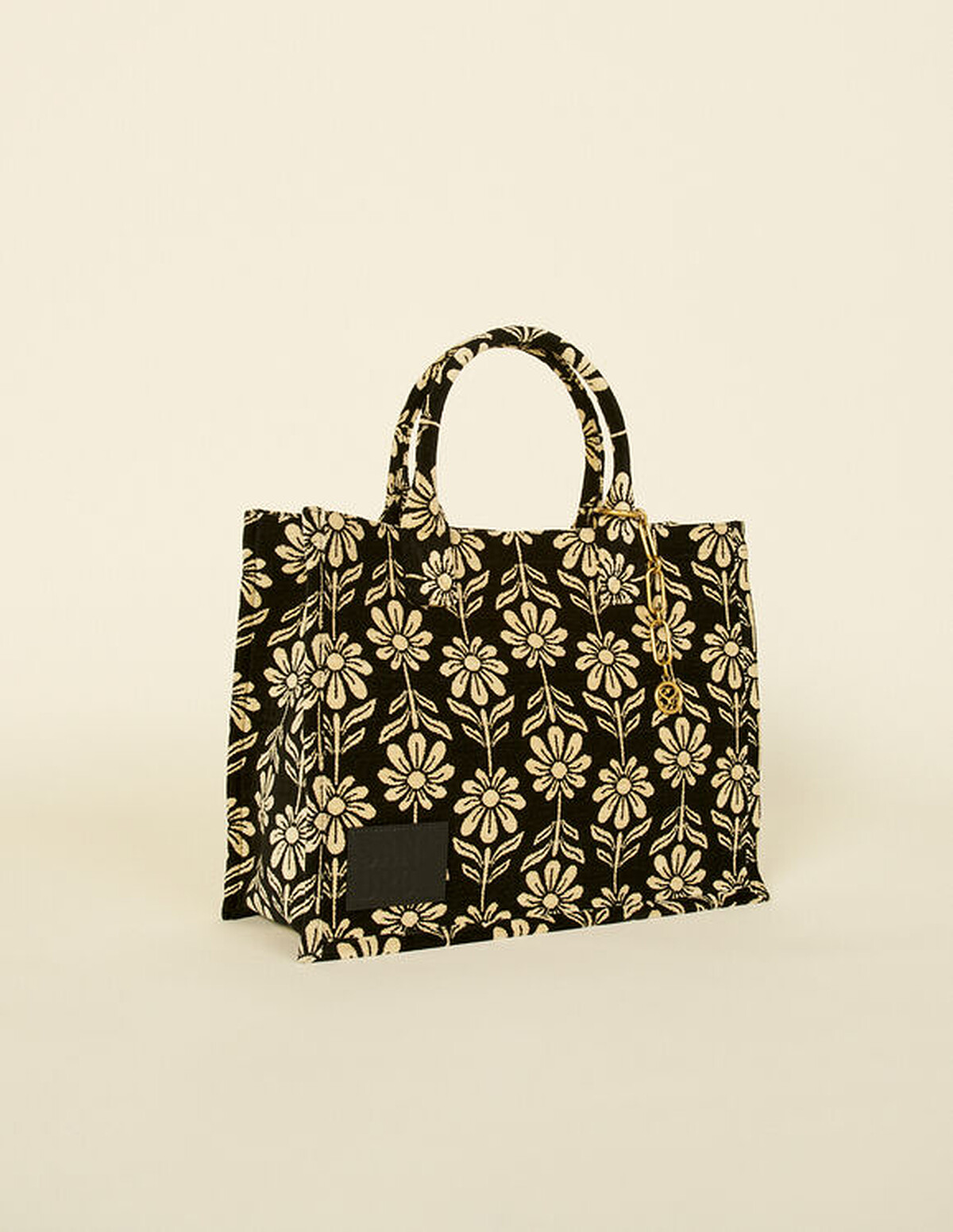 Sandro 印花手提包，價格店洽。