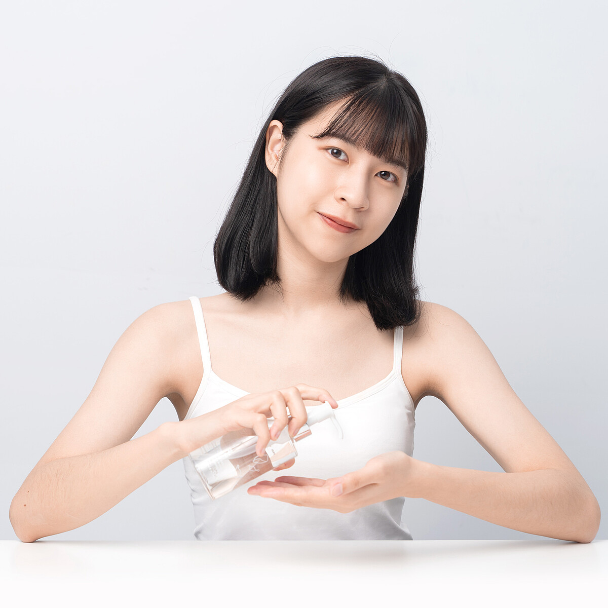 JAN DAN簡單玫瑰賦活卸妝油使用照。