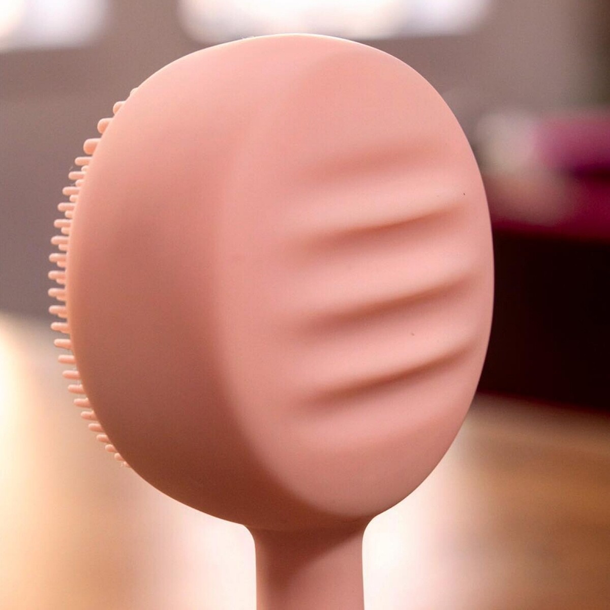 PMD Clean智能潔顏美容儀背面的舒緩波紋。