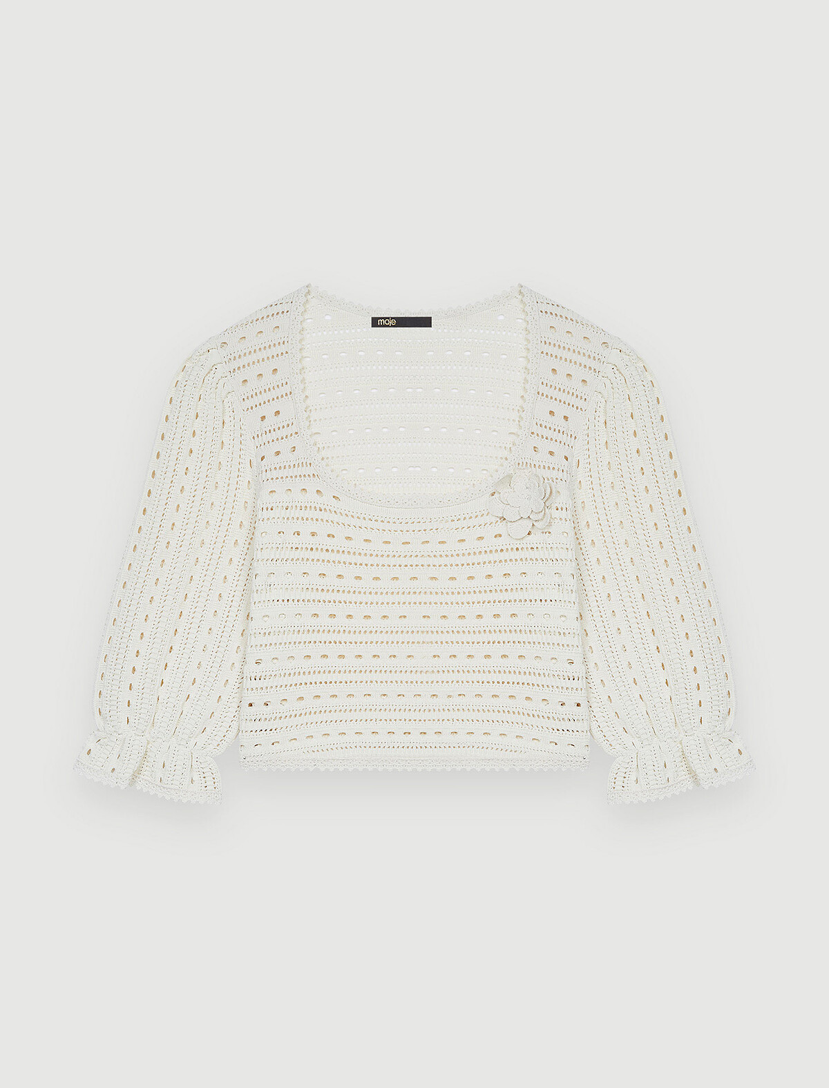 Maje 鏤空花瓣袖上衣，NT8,990。
