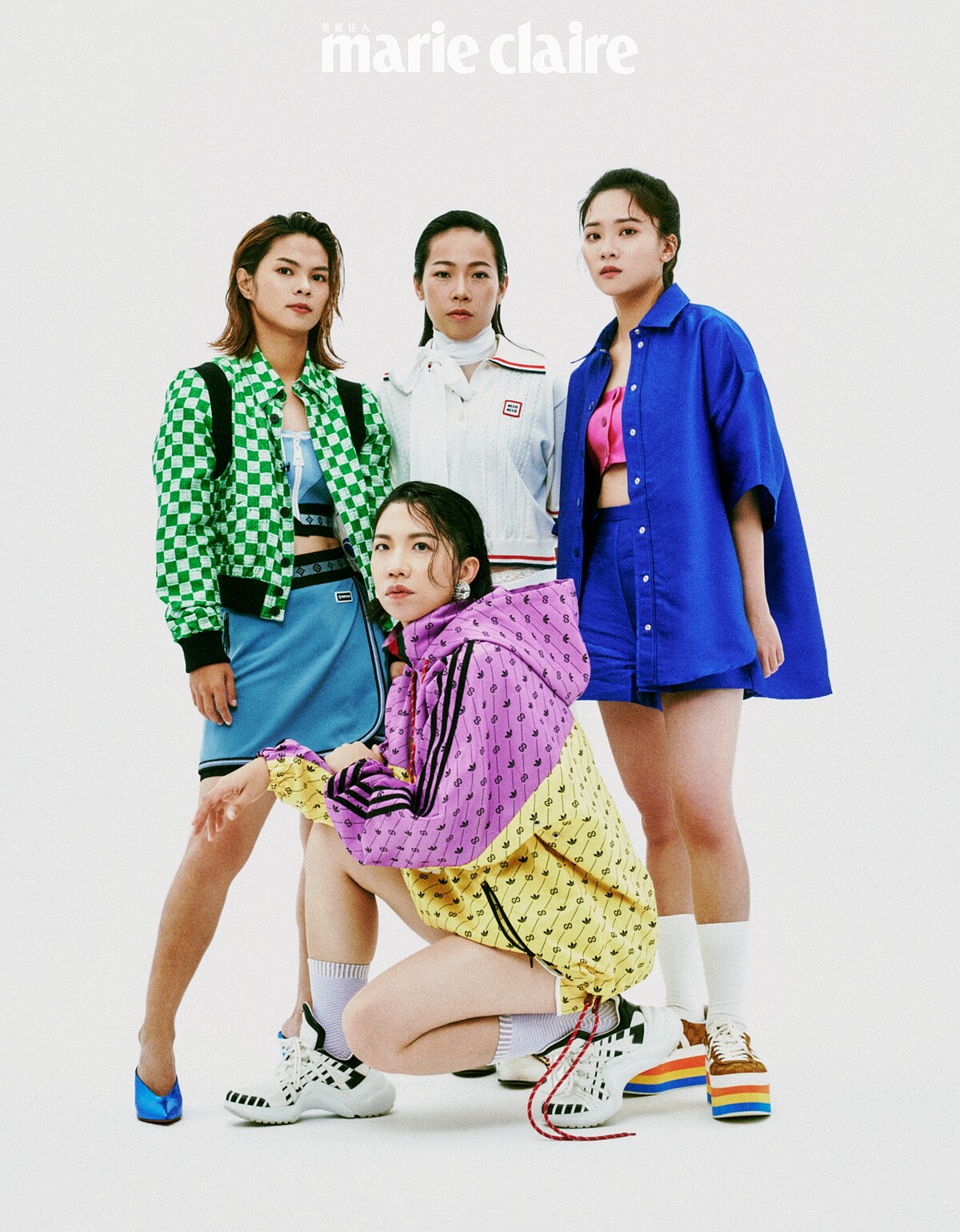 許淑淨／綠色格紋外套、淺藍色運動背心、淺藍色運動短褲，all by Louis Vuitton；藍色高跟鞋，Christian Louboutin。譚雅婷／白色Polo衫、白色薄紗內搭、白色內搭褲、白色及膝裙、白色長襪，all by Miu Miu；白色皮靴，Gucci。姜巧文／藍色襯衫式外套、粉紅色背心、藍色短褲，all by Sandro；高筒運動鞋，Gucci x adidas。程文欣／印花連帽外套、印花短褲，both by Gucci x adidas；耳環，Miu Miu；白色球鞋，Louis Vuitton。