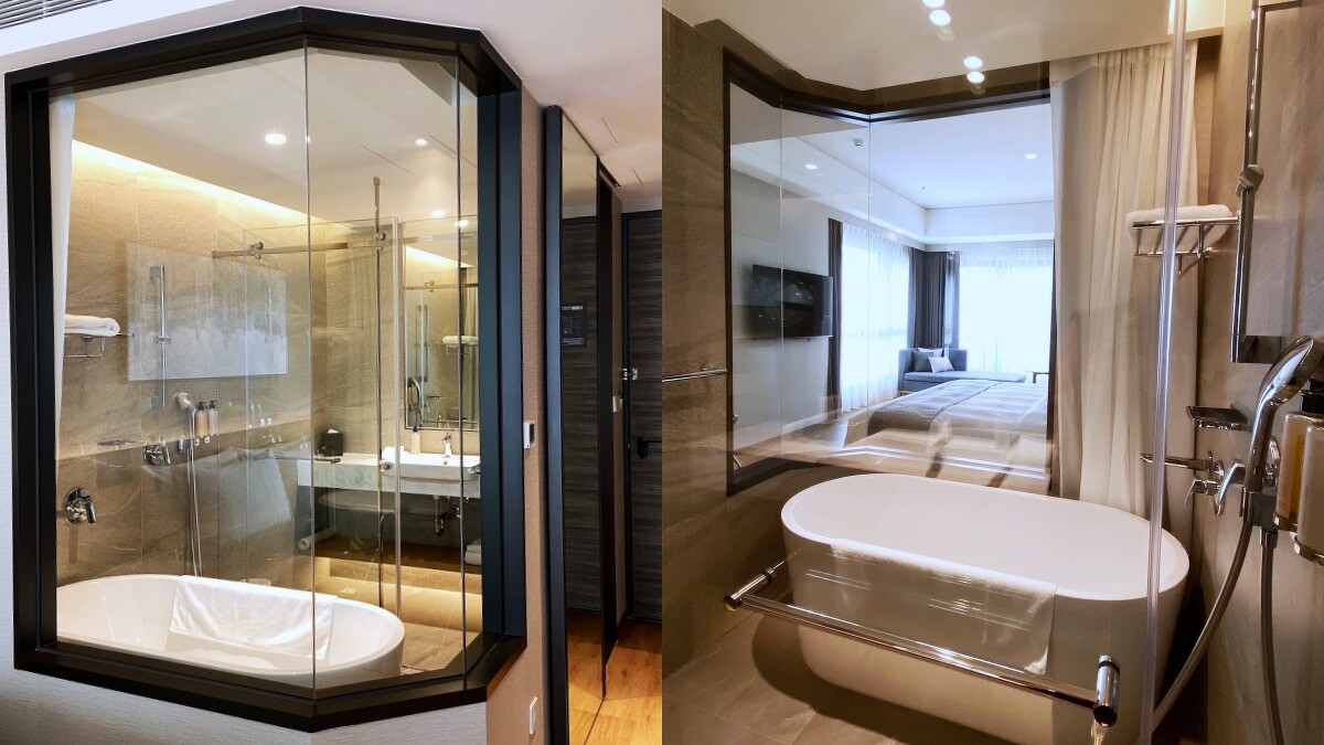 臥室與浴室之間，用大面玻璃設計營造穿透性視覺