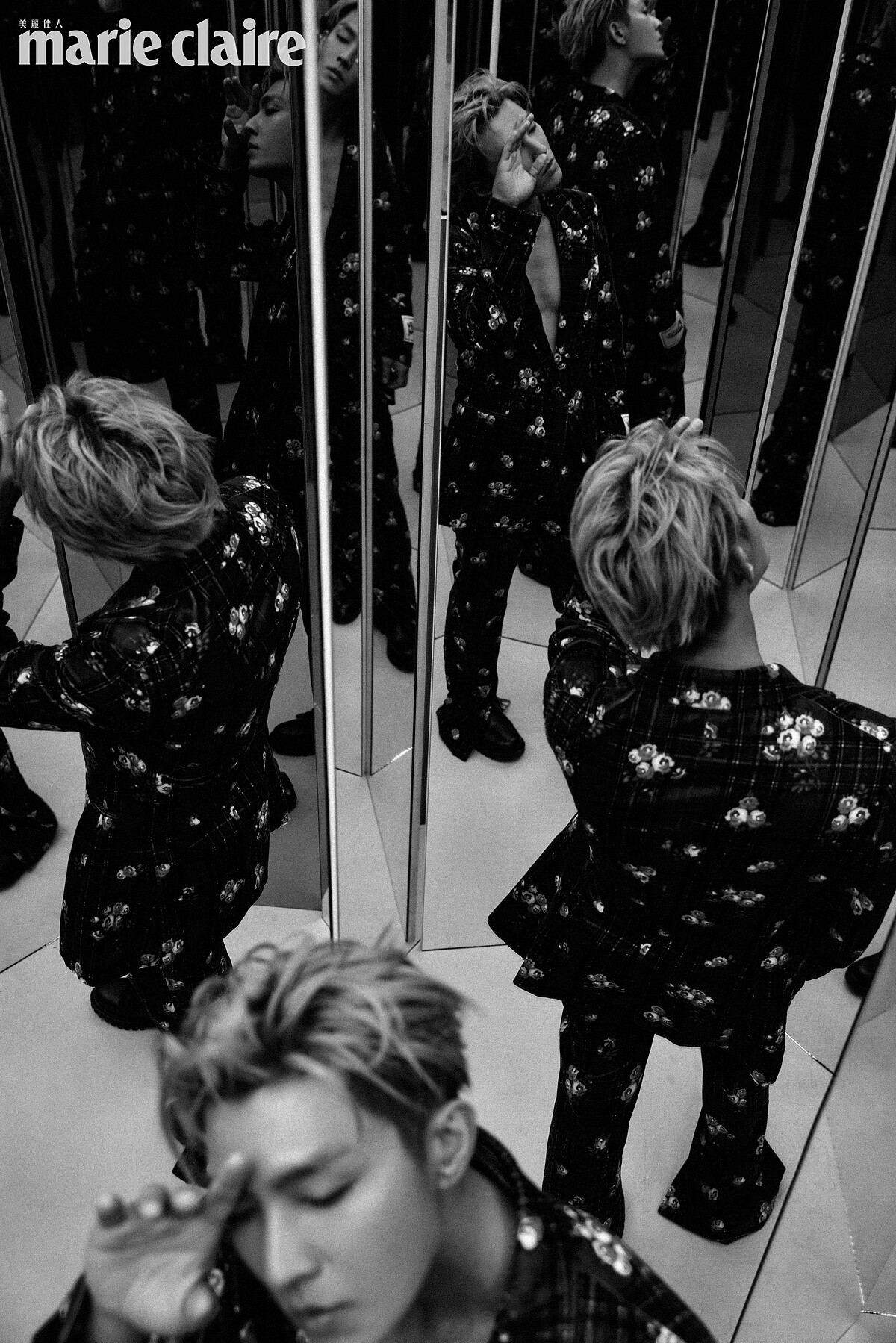 印花格紋西裝外套、印花格紋西裝褲、黑色皮革短靴，all by Tommy Hilfiger。