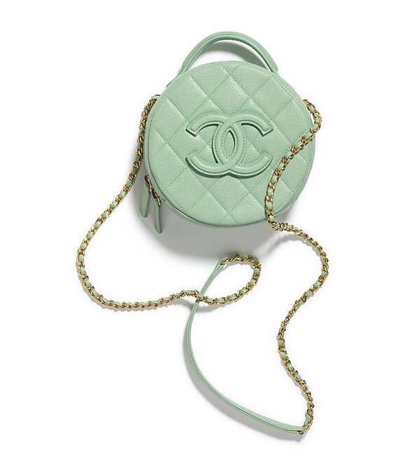 淡綠色皮革菱格紋皮穿鍊圓型小包，NT 133,600