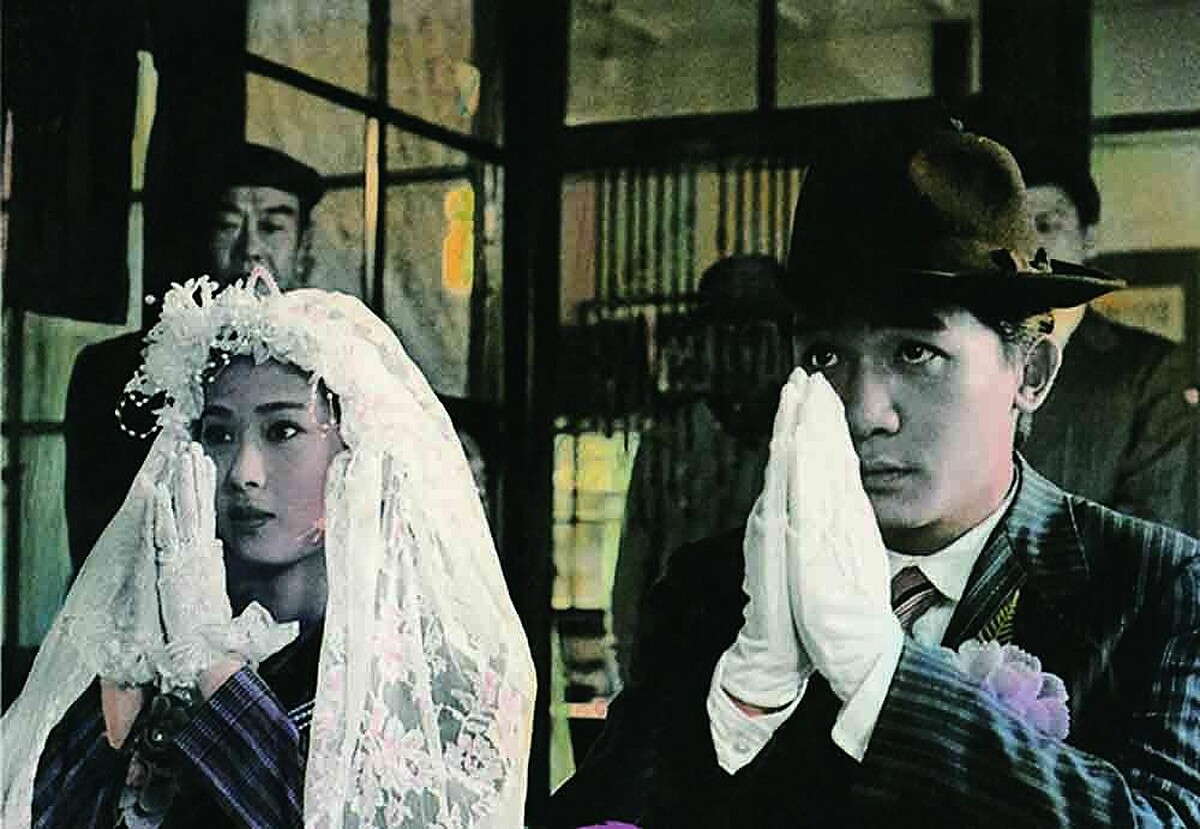 《悲情城市》26歲的梁朝偉與23歲的辛樹芬，在電影中紮紮實實跪拜到九叩首