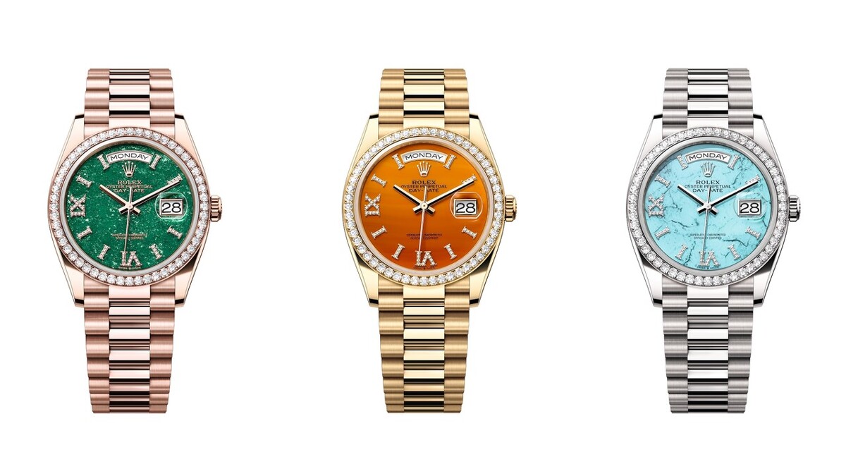（由左至右）Oyster Perpetual Day-Date 36（蠔式恒動星期日曆型 36）腕錶：18K永恒玫瑰金搭配綠色砂金石錶面；18K黃金搭配紅玉髓錶面；18K白色黃金搭配綠松石錶面。