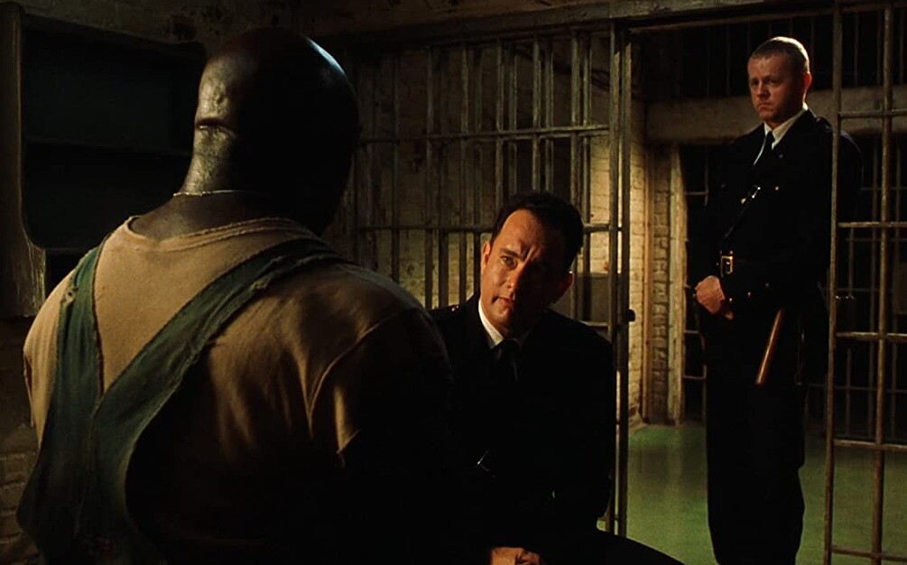 保羅詢問約翰考菲是否該讓他逃離出獄