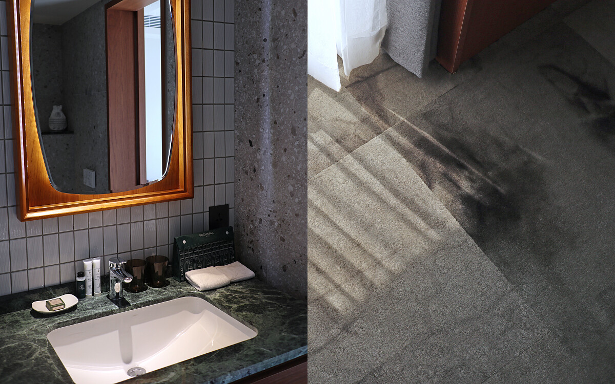 磨石子地板與墨綠色大理石流理檯面呼應了台式裝潢元素。