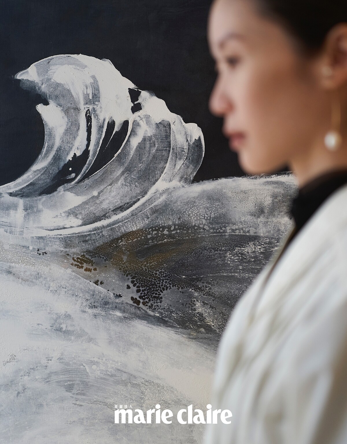 背景為 Aesther Chang 的畫作。