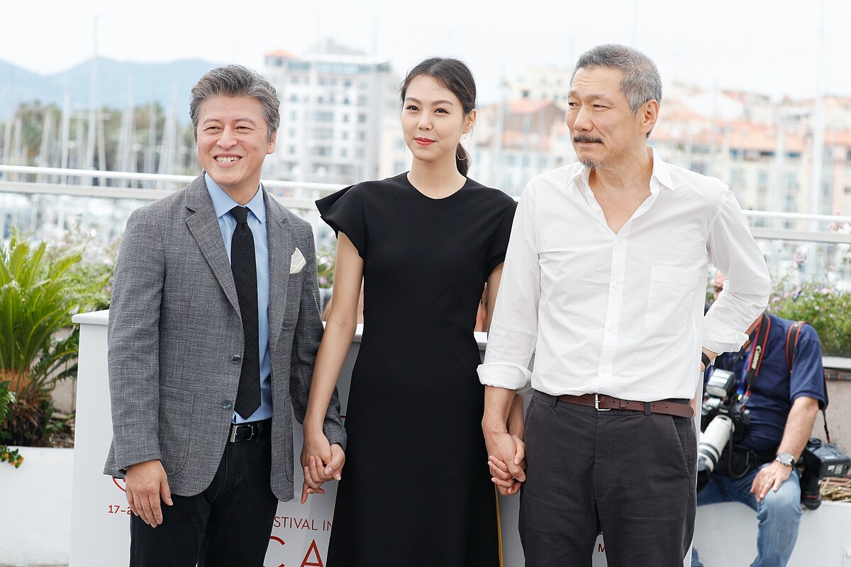 金珉禧(中)與韓國知名導演洪常秀(右)一起出席國際影展(Photo/Gettyimages)。