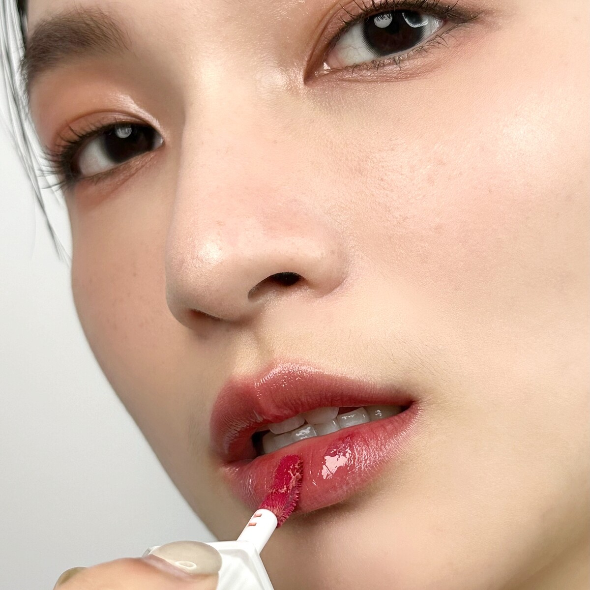 shu uemura植村秀無色限水光嫩唇露(#BG 936 清透蜜桃奶杏)，NT1,250