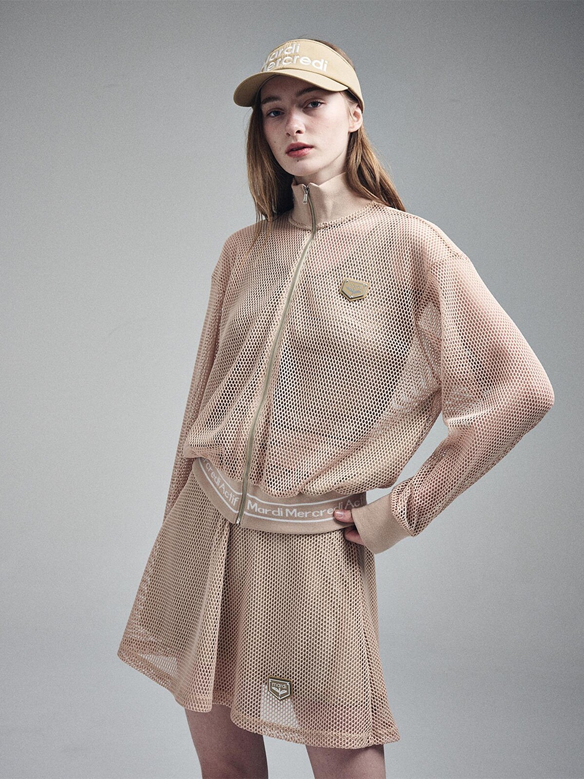 BLOOMMARDI 金屬徽章網布高領拉鍊外套,NT5,280。