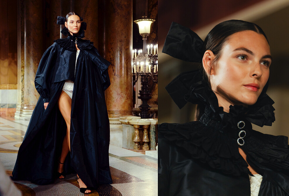 名模Vittoria Ceretti以一件黑色絲緞塔夫綢大斗篷開場，引領大家欣賞這場精彩的大秀。