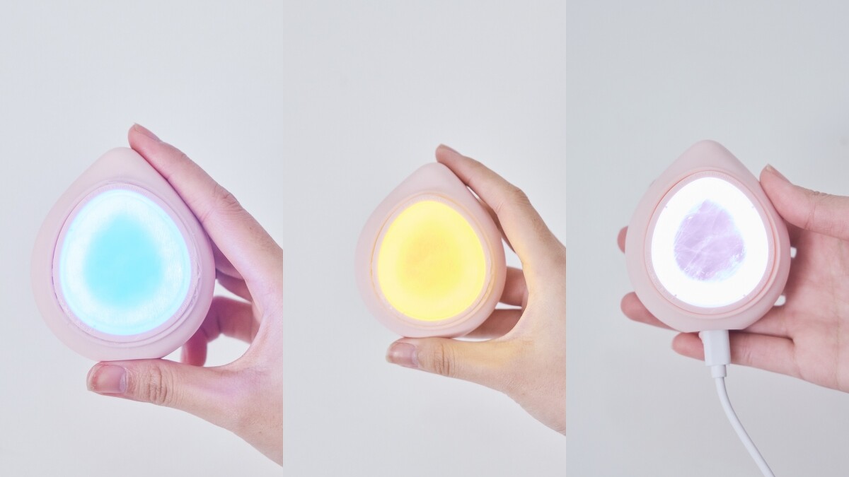 NUEVA AQUA&trade;玫瑰晶礦光面膜機的藍光、黃光、紅光。