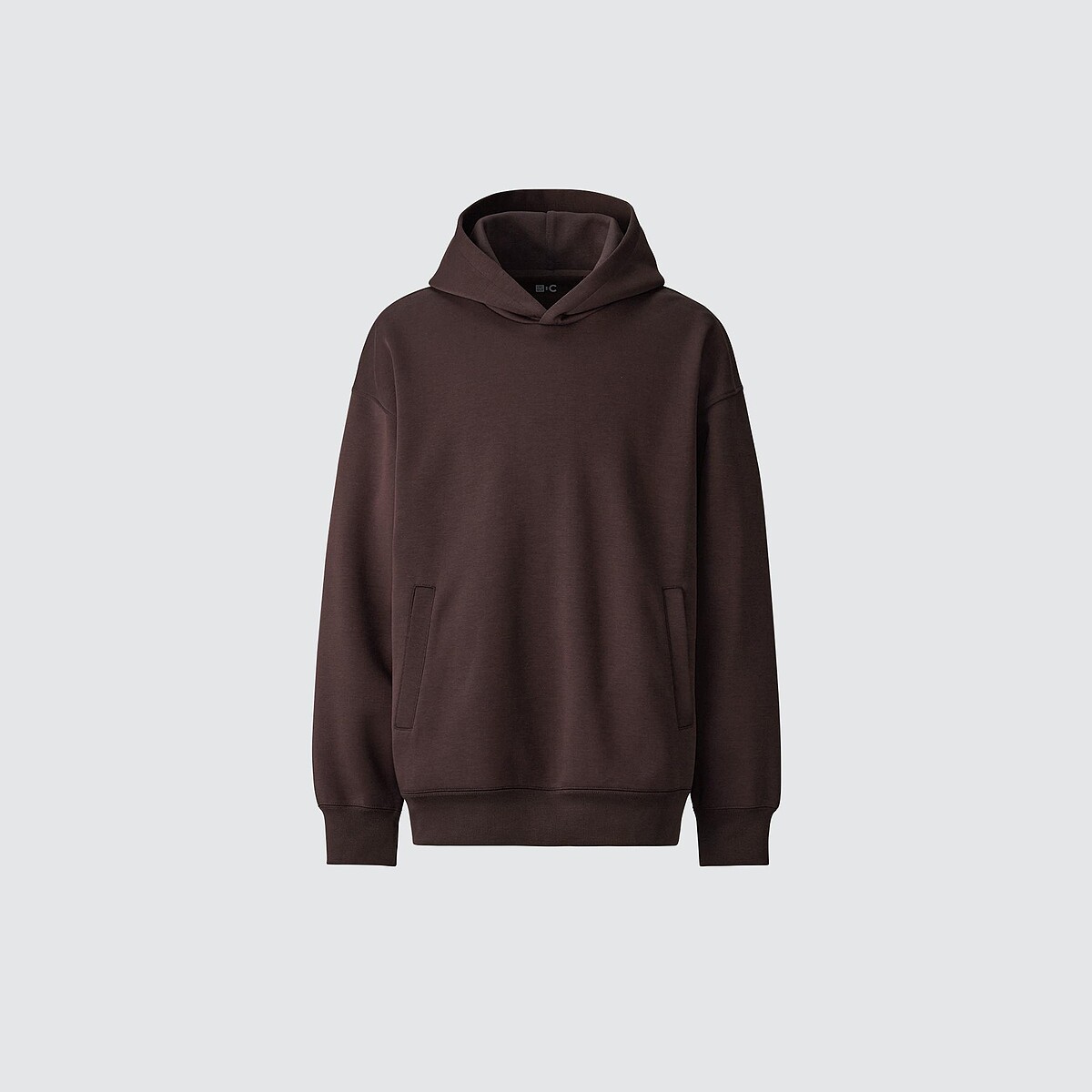 男女適穿 寬版休閒連帽上衣，NT$1,290。