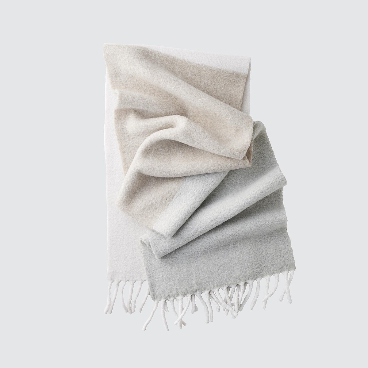 男女適用 柔軟舒膚披巾，NT$990。