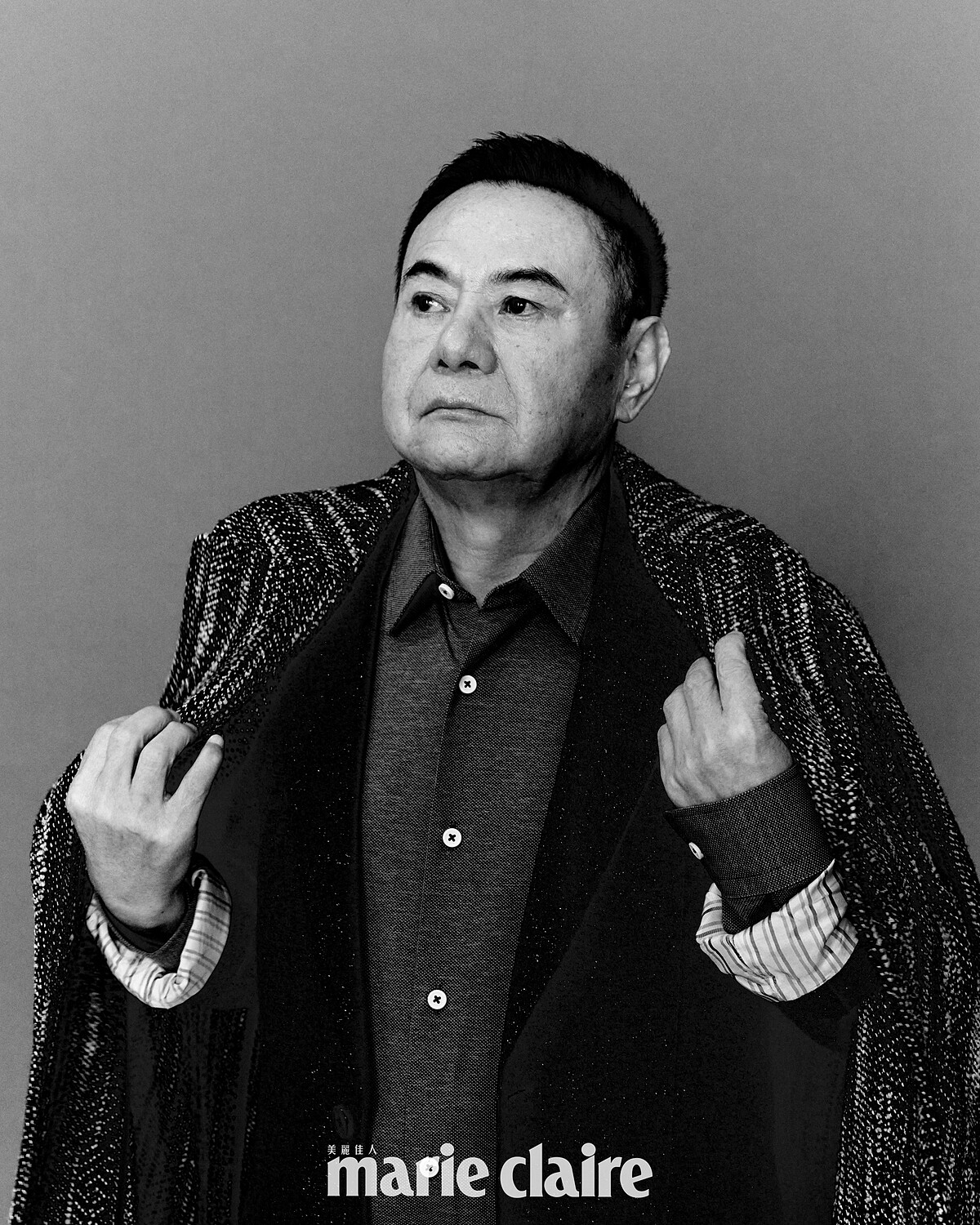 蔡振南/灰色襯衫、黑色西裝外套、格紋長版大衣,all by Boss。