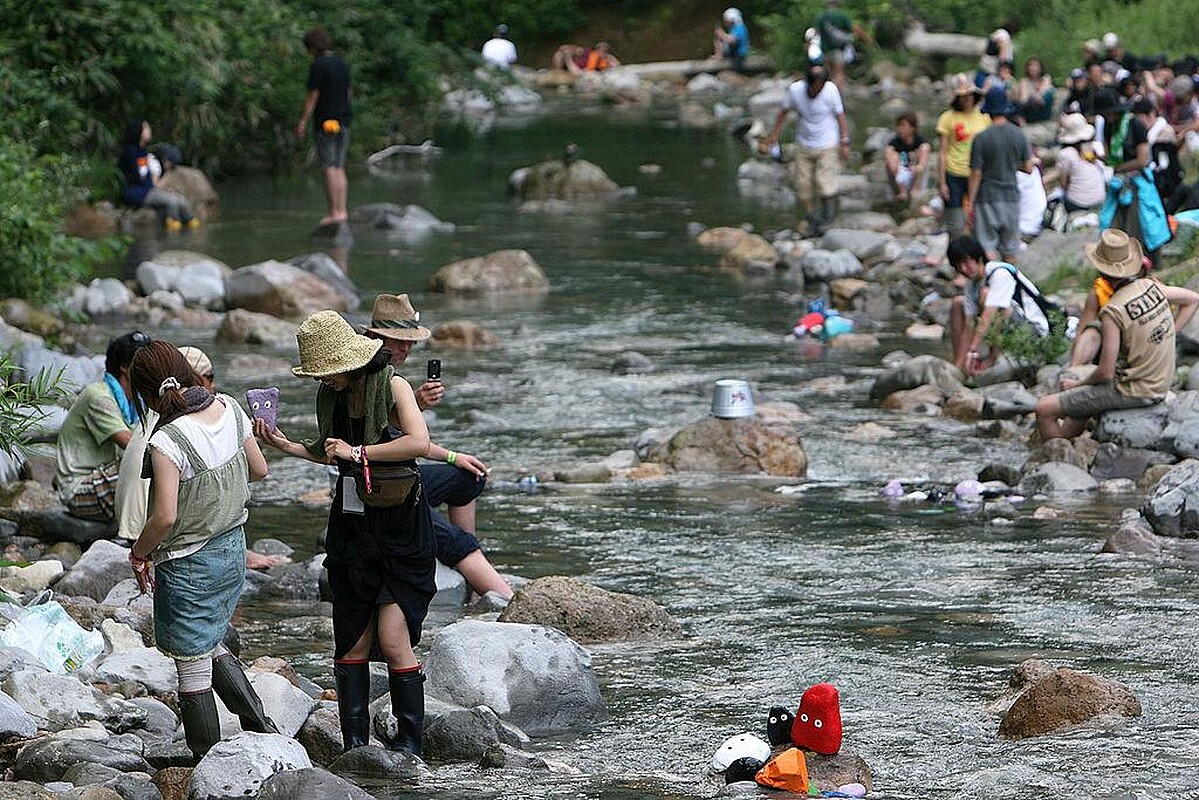 YUZAWA, JAPAN - JULY 26: People spend their time between concerts during the Fuji Rock Festival at Naeba Ski Resort on July 26, 2008 in Yuzawa, Niigata, Japan. (Photo by Kiyoshi Ota/Getty Images)