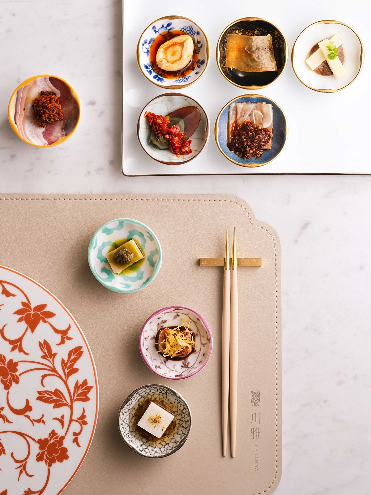 川雅「涼菜九宮格」，包含紅油鮑魚、燈影魚片等多款精緻涼菜