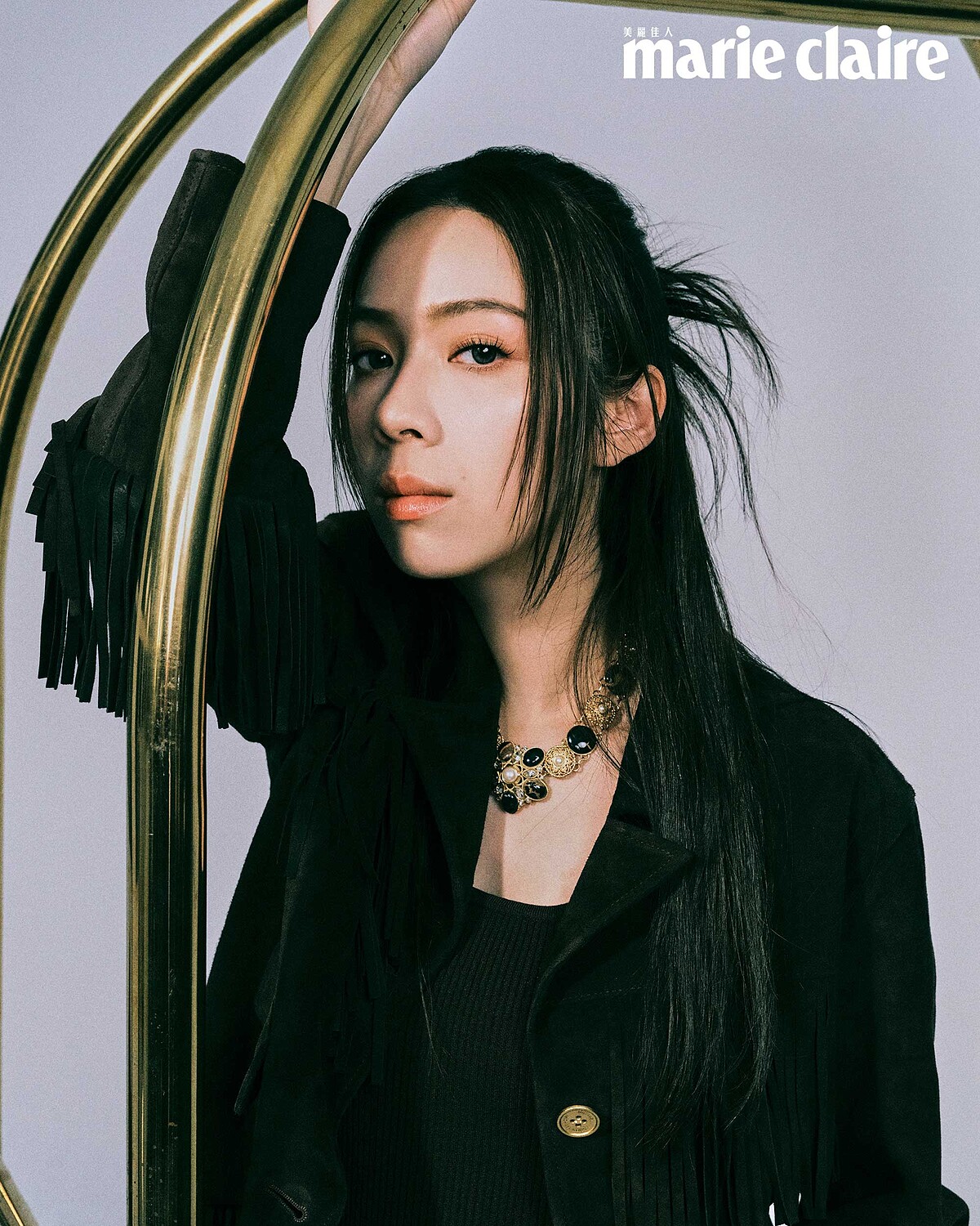 流蘇套裝、黑色上衣，both by Michael Kors