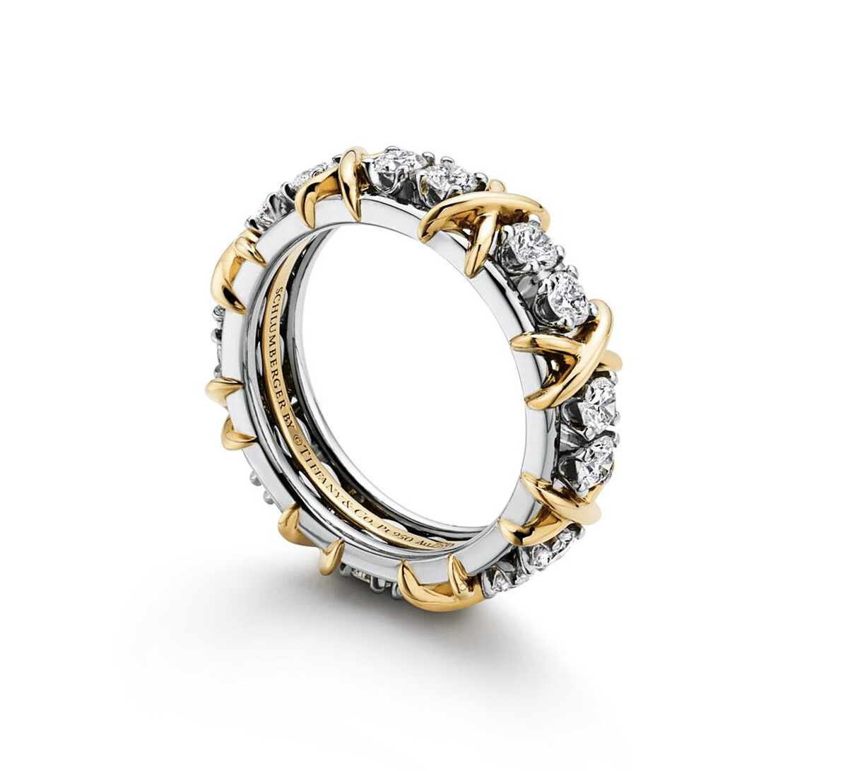 Sixteen Stone by Tiffany 系列戒指，18K金及鉑金鑲圓形明亮式切割鑽石，售價店洽。