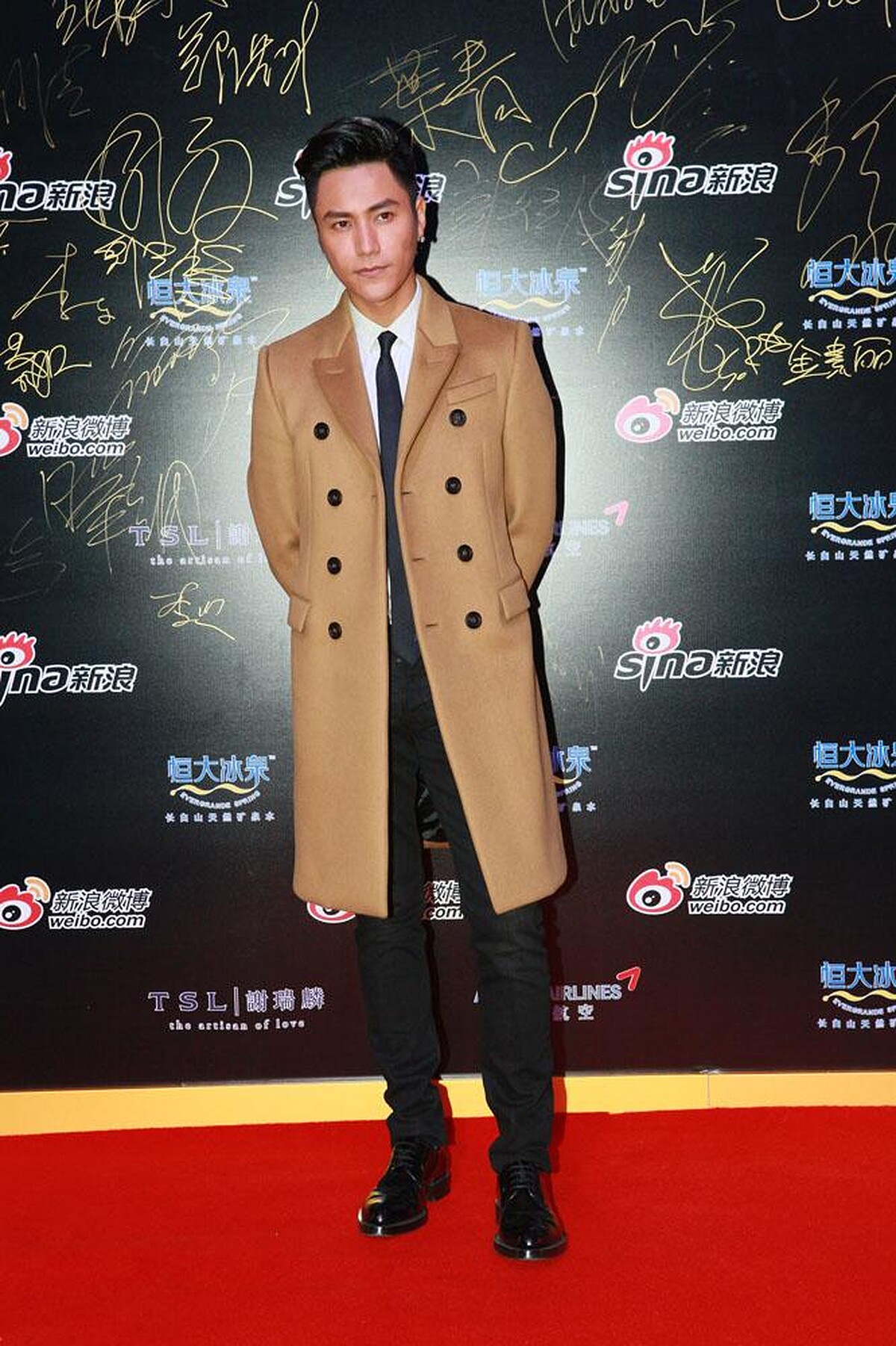 Chen Kun wearing Burberry outerwear