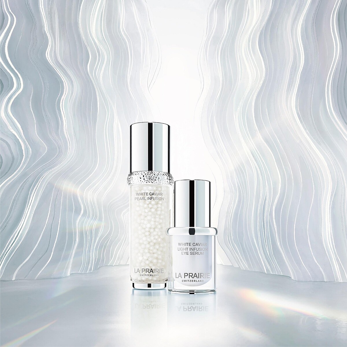 （左）LA PRAIRIE 鑽白魚子時空亮顏菁華、（右）LA PRAIRIE 鑽白魚子時空亮眼精華。