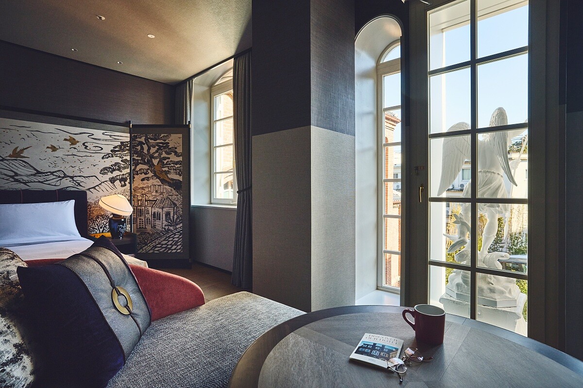 客房有新舊融合鮮明的風格。