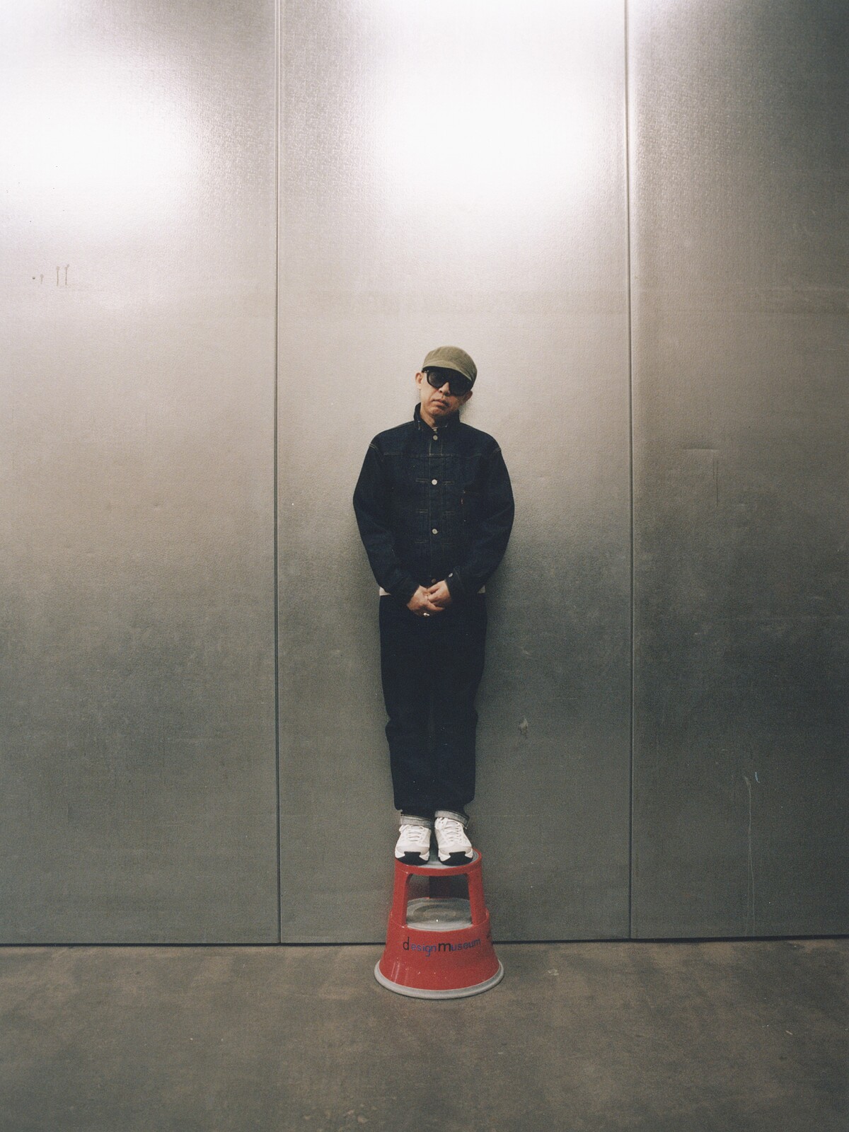 NIGO photographed at the Design Museum. Photo credit Elliot James Kennedy 。