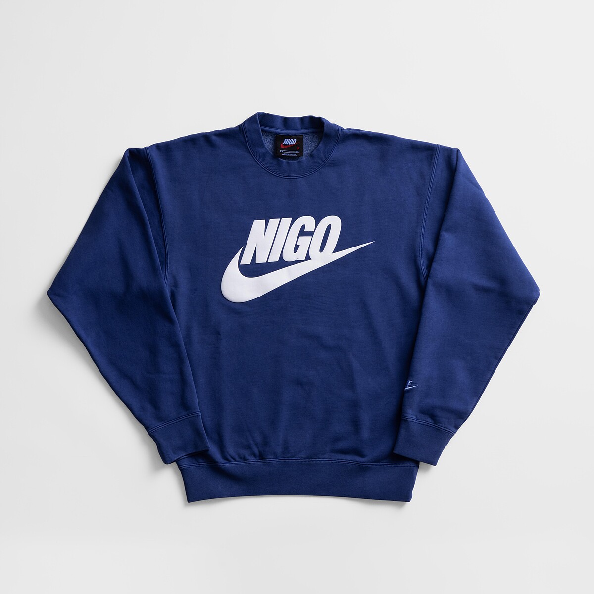 NIGO x Nike Blue Sweatshirt featuring in NIGO: From Japan with Love at the Design Museum. Photo courtesy of NIGO.