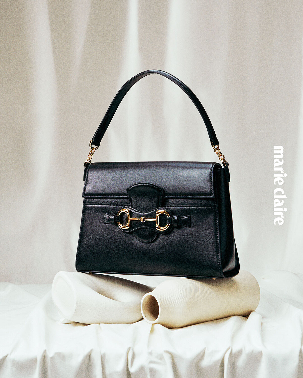黑色皮革 Horsebit Duomo手提包,Gucci。