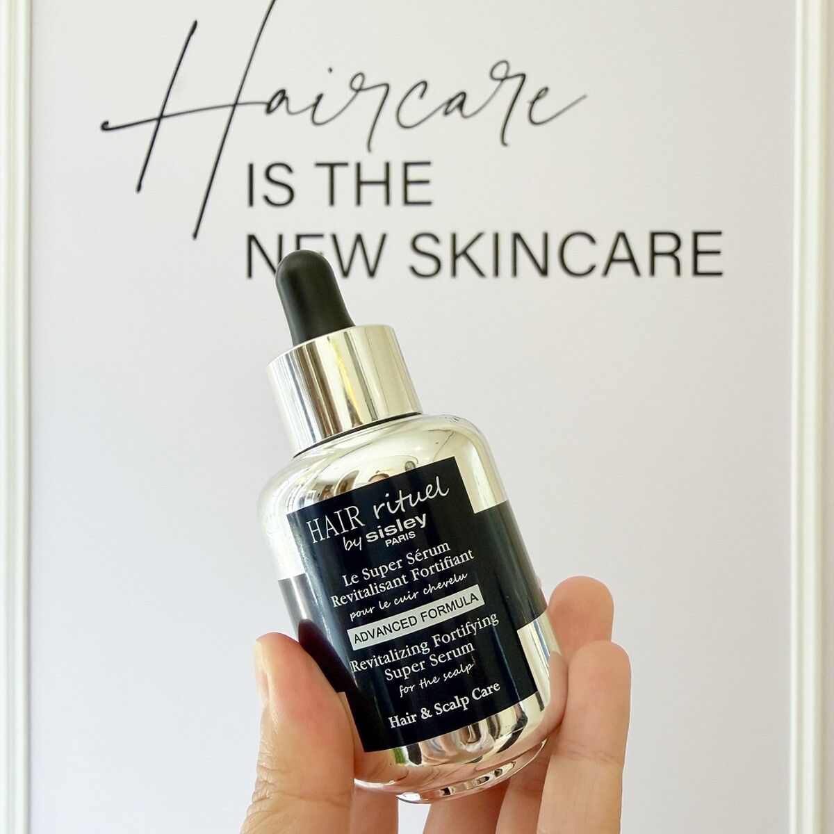 Hair Rituel by Sisley賦活重升超極髮精華。